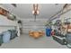 Attached garage with additional storage and work space at 4111 Hemingway Dr, Venice, FL 34293