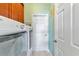 Bright laundry room with washer and dryer at 4111 Hemingway Dr, Venice, FL 34293