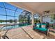 Relaxing pool area with lake view at 4111 Hemingway Dr, Venice, FL 34293