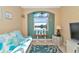 Relaxing sitting area with water view and comfortable furnishings at 4111 Hemingway Dr, Venice, FL 34293
