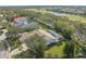 Aerial view of a home with pool, situated on a golf course community at 4214 Palacio Dr, Sarasota, FL 34238