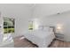 Spacious bedroom with a king-size bed and large window at 4214 Palacio Dr, Sarasota, FL 34238