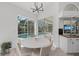 Kitchen nook with view of pool and sliding glass doors at 4214 Palacio Dr, Sarasota, FL 34238