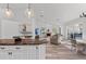 Open concept kitchen with granite countertop and island at 4214 Palacio Dr, Sarasota, FL 34238