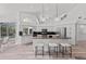 Spacious kitchen with granite countertops, stainless steel appliances, and breakfast bar at 4214 Palacio Dr, Sarasota, FL 34238