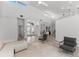 Bright living room with high ceilings, hardwood floors, and a view of the pool at 4214 Palacio Dr, Sarasota, FL 34238