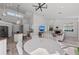 Open living area features vaulted ceiling and access to the kitchen and pool at 4214 Palacio Dr, Sarasota, FL 34238