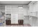 Large walk-in closet with ample shelving and hanging space at 4214 Palacio Dr, Sarasota, FL 34238