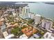 Aerial view of waterfront highrise condo building and surrounding neighborhood at 435 S Gulfstream Ave # 604, Sarasota, FL 34236