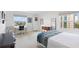 Bright bedroom features neutral colors, large windows, desk space and a decorative dresser at 435 S Gulfstream Ave # 604, Sarasota, FL 34236