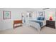 Comfortable bedroom featuring a large window, dresser, full length mirror and art at 435 S Gulfstream Ave # 604, Sarasota, FL 34236