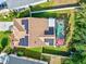 Aerial view of house with solar panels and pool at 4440 Sanibel Way, Bradenton, FL 34203