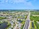 Aerial view of community near highway and lake at 4440 Sanibel Way, Bradenton, FL 34203