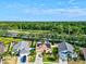 Aerial view of house with solar panels and landscaped yard at 4440 Sanibel Way, Bradenton, FL 34203