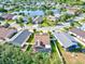 Aerial view of house with solar panels and pool at 4440 Sanibel Way, Bradenton, FL 34203