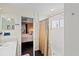 Bathroom with shower/tub combo and view of bedroom at 4440 Sanibel Way, Bradenton, FL 34203