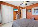 Bedroom with a leopard print comforter and large closet at 4440 Sanibel Way, Bradenton, FL 34203
