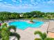 Community pool with clubhouse in background at 4440 Sanibel Way, Bradenton, FL 34203
