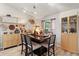 Light and airy dining area with built-in cabinets and hardwood floors at 4440 Sanibel Way, Bradenton, FL 34203