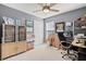 Home office with wood desk and comfortable office chair at 4440 Sanibel Way, Bradenton, FL 34203