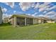 Home with fenced backyard and screened patio at 5282 Grove Mill Loop, Bradenton, FL 34211