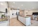 Spacious kitchen with granite countertops and white cabinets at 5282 Grove Mill Loop, Bradenton, FL 34211