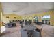 A covered outdoor area showcases multiple seating arrangements for relaxation and gatherings at 5282 Grove Mill Loop, Bradenton, FL 34211