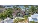 Luxury waterfront home with private dock and lush landscaping at 603 Harbor Shore Dr, Nokomis, FL 34275