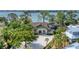 Luxury waterfront home with private drive and lush landscaping at 603 Harbor Shore Dr, Nokomis, FL 34275