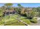 Aerial view of the home and backyard, showcasing the dock at 603 Harbor Shore Dr, Nokomis, FL 34275