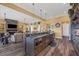 Open kitchen island with granite countertops, perfect for entertaining at 603 Harbor Shore Dr, Nokomis, FL 34275