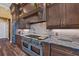 Luxury kitchen with high-end appliances and custom cabinetry at 603 Harbor Shore Dr, Nokomis, FL 34275
