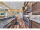 Modern kitchen with granite countertops and stainless steel appliances at 603 Harbor Shore Dr, Nokomis, FL 34275