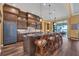 Spacious kitchen with custom cabinetry and beautiful blue range at 603 Harbor Shore Dr, Nokomis, FL 34275