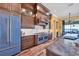 Chef's kitchen with blue range and ample counter space at 603 Harbor Shore Dr, Nokomis, FL 34275