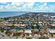 Coastal property aerial view, showcasing a single-Gathering home with canal access at 606 Gladstone Ln, Holmes Beach, FL 34217