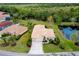 Bird's-eye view of a single-Gathering home with a pond nearby at 644 Rivendell Blvd, Osprey, FL 34229