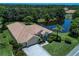 Single-Gathering home situated on a lush lot near a lake at 644 Rivendell Blvd, Osprey, FL 34229