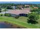 Aerial view of home with water view at 644 Rivendell Blvd, Osprey, FL 34229