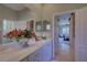 Double vanity bathroom with access to bedroom at 644 Rivendell Blvd, Osprey, FL 34229