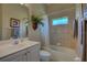 Clean bathroom with shower/tub combo at 644 Rivendell Blvd, Osprey, FL 34229