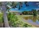 Backyard view of home with pond view at 644 Rivendell Blvd, Osprey, FL 34229
