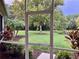 View of backyard from screened porch at 644 Rivendell Blvd, Osprey, FL 34229