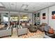 Community clubhouse lobby with comfortable seating at 653 Cedars Ct, Longboat Key, FL 34228