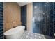 Spa-like bathroom with a freestanding tub and walk-in shower at 6530 Peacock Rd, Sarasota, FL 34242