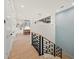 Modern staircase with open risers leading to the upper level at 6530 Peacock Rd, Sarasota, FL 34242