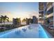 Resort-style pool with city views and lounge area at 668 Quay Commons # 1102, Sarasota, FL 34236