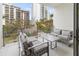 Spacious balcony with city views and comfortable seating at 711 S Palm Ave # 303, Sarasota, FL 34236