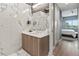 Stylish bathroom with marble vanity and floating sink at 711 S Palm Ave # 303, Sarasota, FL 34236