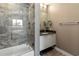 Contemporary bathroom with a tub, shower, and floating vanity at 711 S Palm Ave # 303, Sarasota, FL 34236